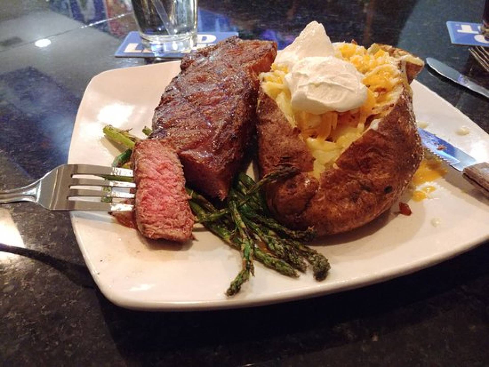 Grilled Steak with Loaded Baked Potato