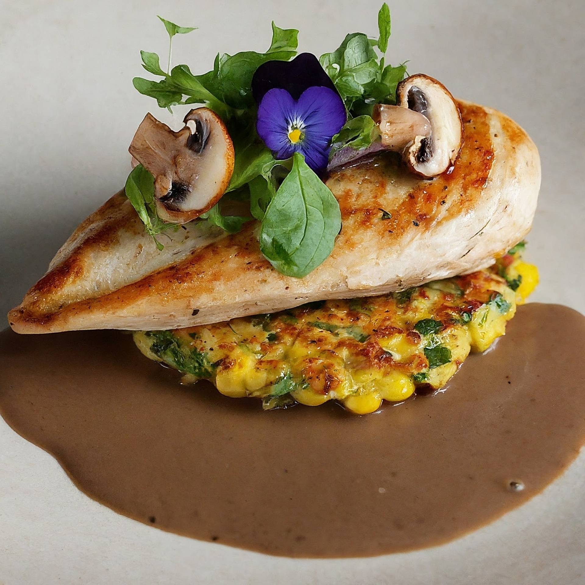 Seared Chicken with Mushroom Jus & Corn Fritters